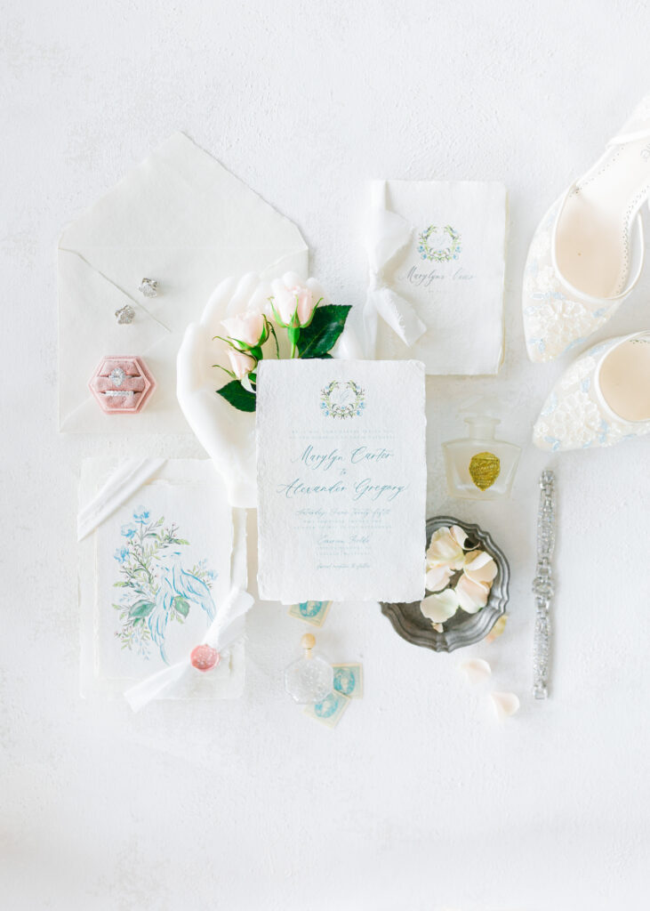 white and blue invitation suite with birds